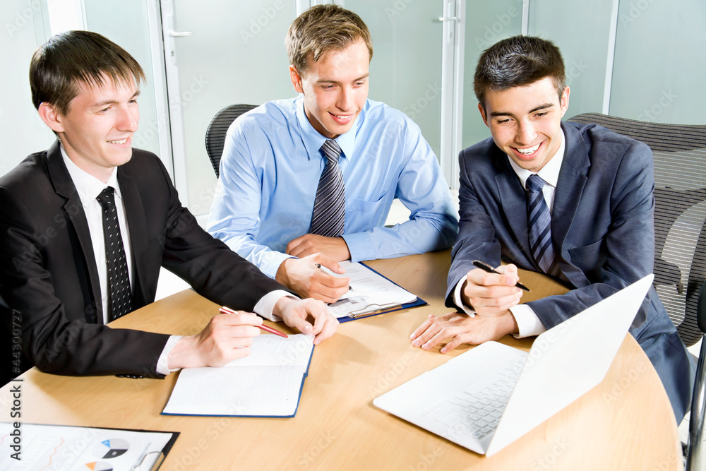 Business team working on their business project Business team working on their business project