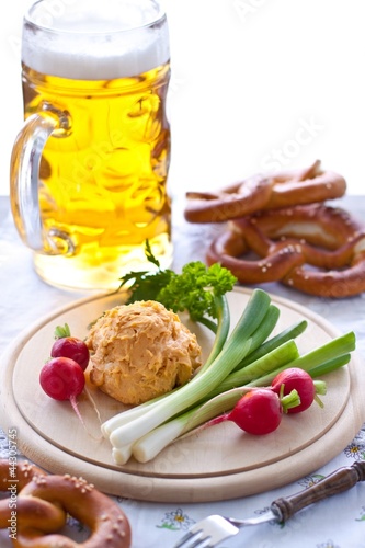 Obatzda cheese with pretzel and beer photo