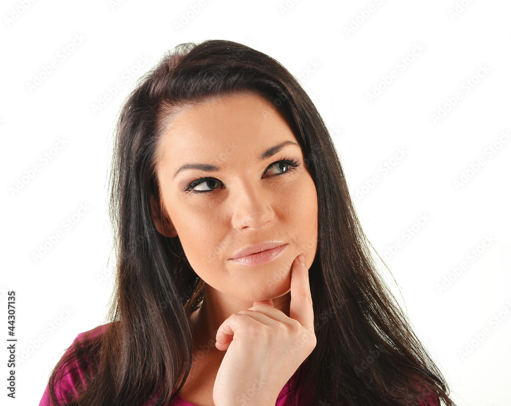 Young attractive woman in a thoughtful pose isolated on white Young attractive woman in a thoughtful pose isolated on white