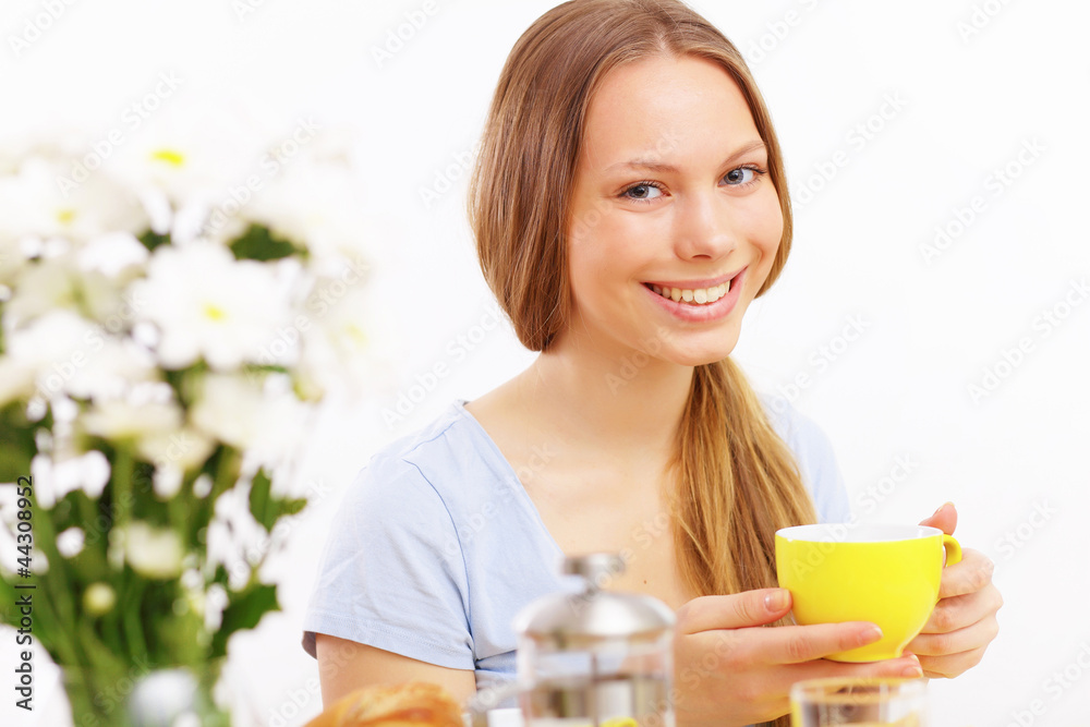 Beautiful young woman drinking tea Beautiful young woman drinking tea