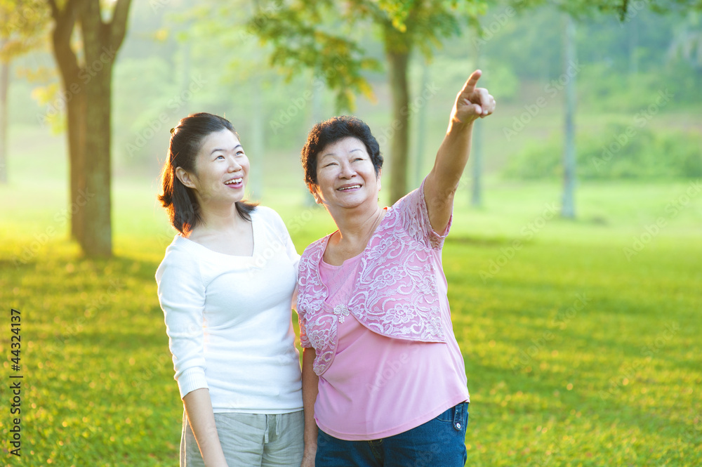 Asian senior mother with her daughter Asian senior mother with her daughter