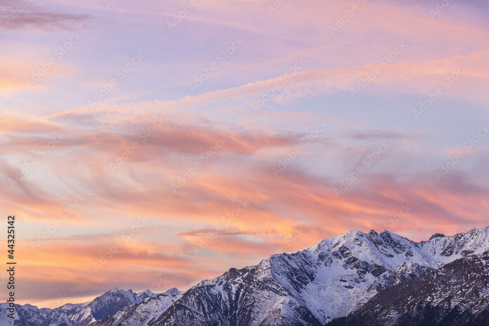 Alp mountain peaks in sunset