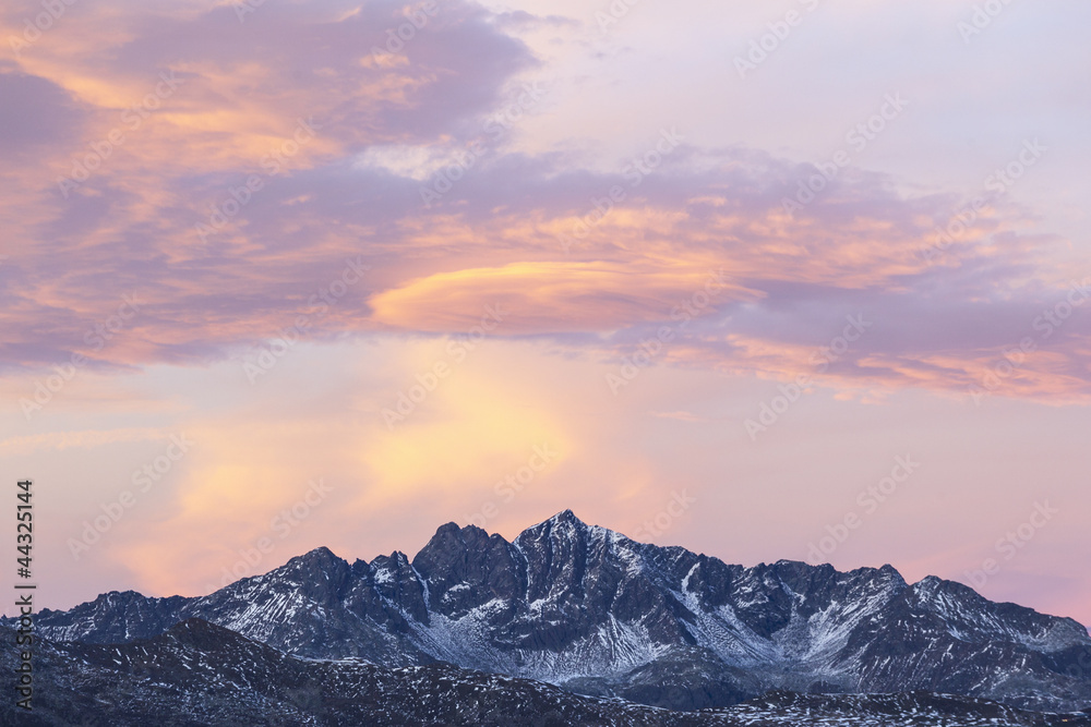 Mountain peaks in sunset