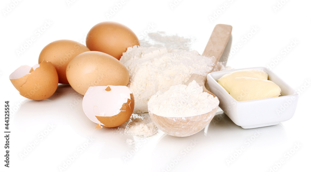 Eggs, flour and butter isolated on white
