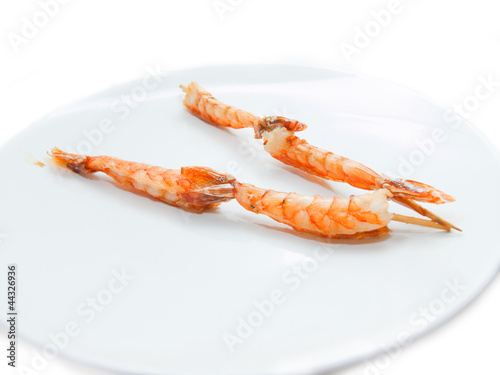 Japanese skewered with  Shrimp on white plate.isolated on white