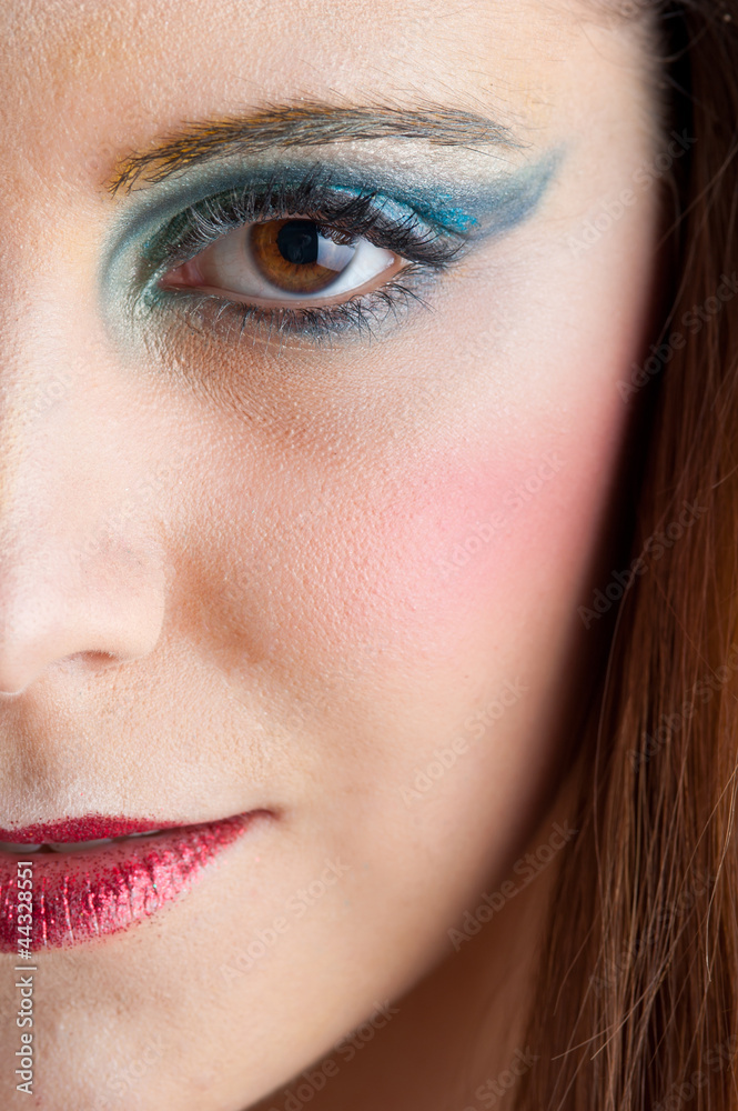 Fototapeta premium Portrait of beautiful smiling girl with make up