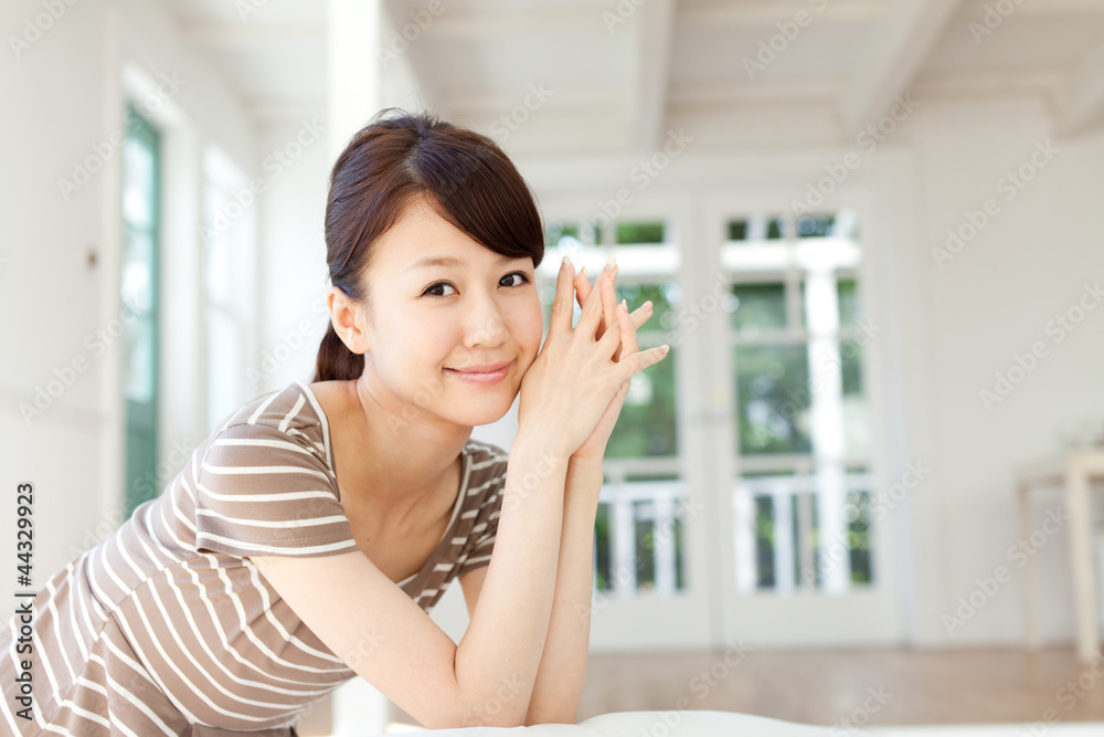 Beautiful young woman relaxing in the room Beautiful young woman relaxing in the room