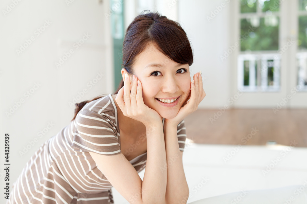 Beautiful young woman relaxing in the room Beautiful young woman relaxing in the room