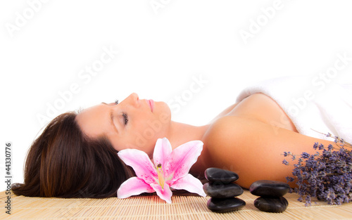 Beautiful woman relaxing in spa