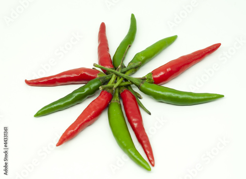 Thai green and red hot chili on white background