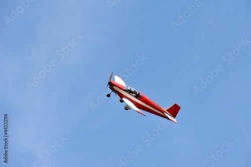 Red Airplane in the blue sky