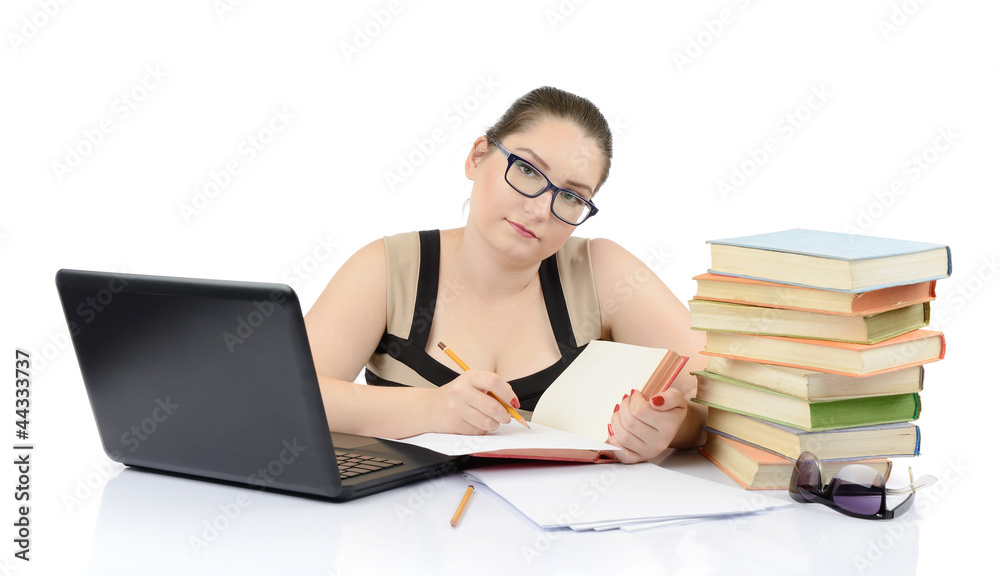 Beautiful young girl with notebook and books on white background Beautiful young girl with notebook and books on white background