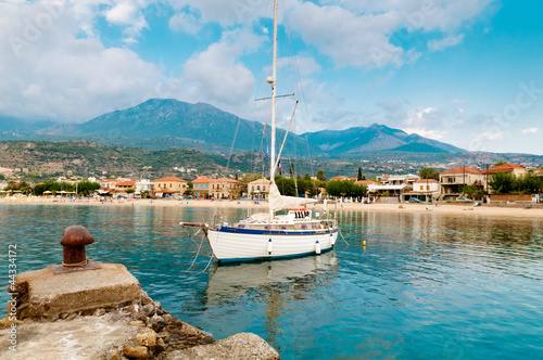 Yacht moored along Coast of Peloponnese Peninsula in Greece photo