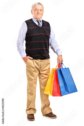 Mature man with shopping bags