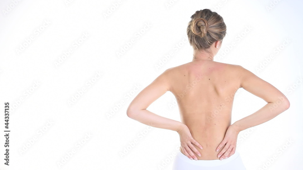 woman massaging her back, shoulders, neck woman massaging her back, shoulders, neck