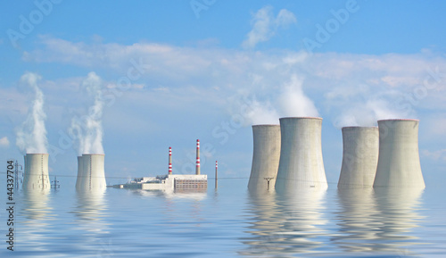 Flooded nuclear power plant. Ecological catastrophe concept. photo