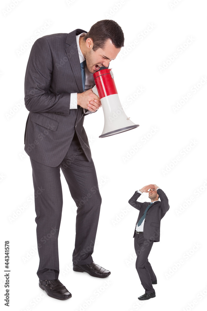 Boss screaming in megaphone at employee