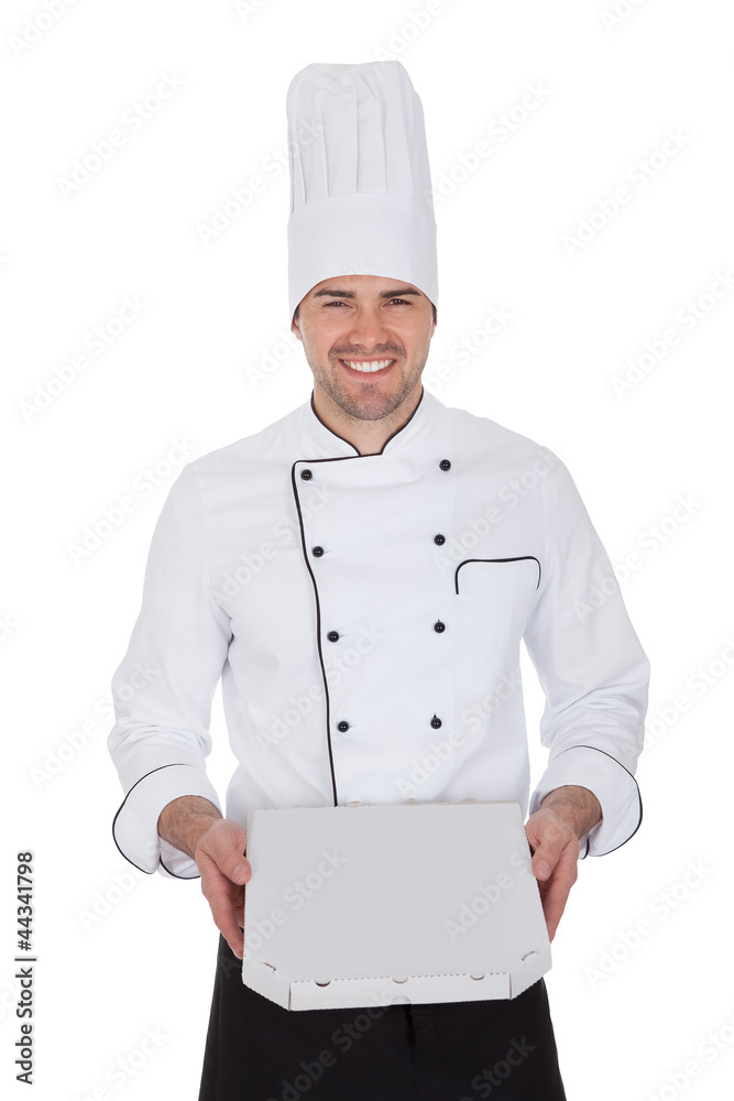 Portrait of happy chef holding pizza box Portrait of happy chef holding pizza box