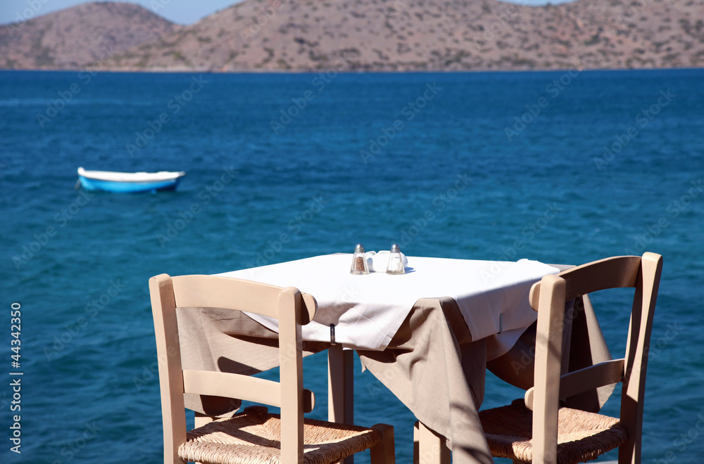 traditional greek outdoor restaurant (Crete, Greece) ).