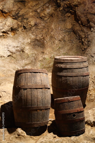 Three wine or beer butts in a cave