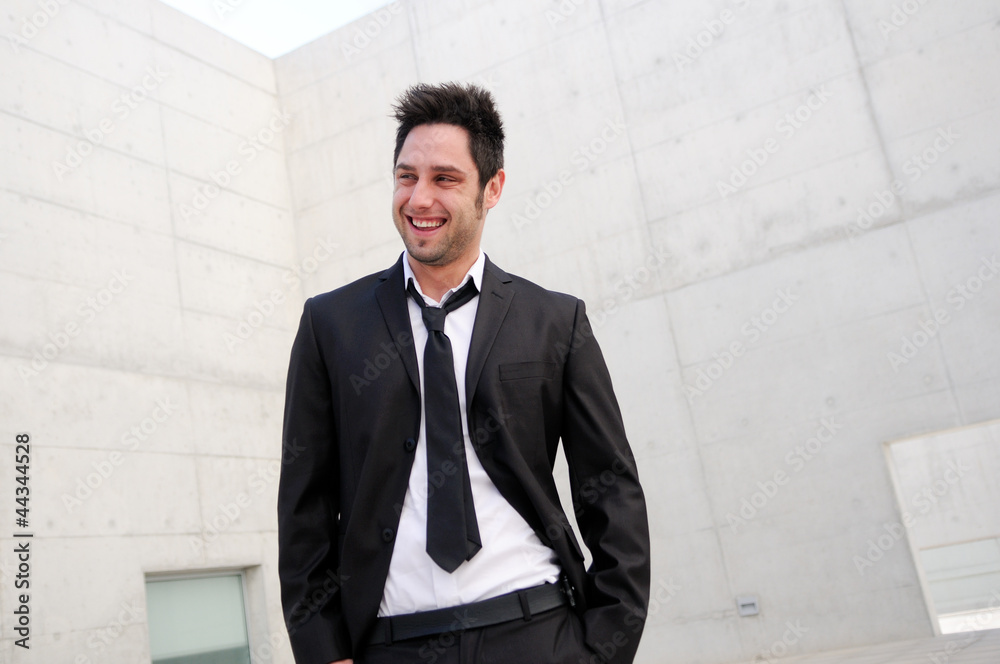 Portrait of a handsome young business man smiling Portrait of a handsome young business man smiling