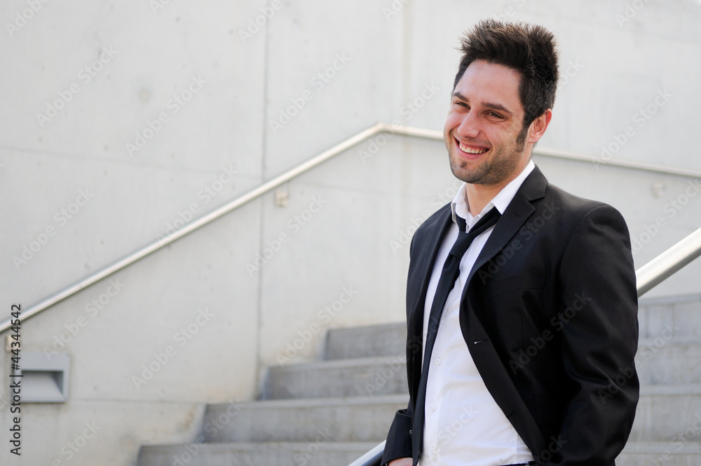 Portrait of a handsome young smiling business man