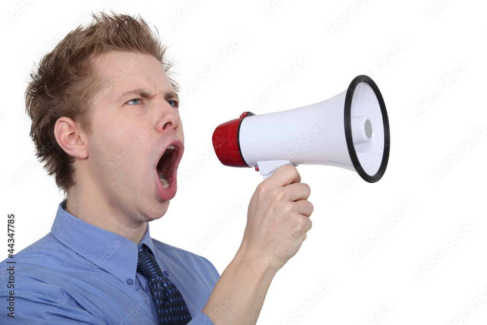 man shouting through a megaphone man shouting through a megaphone