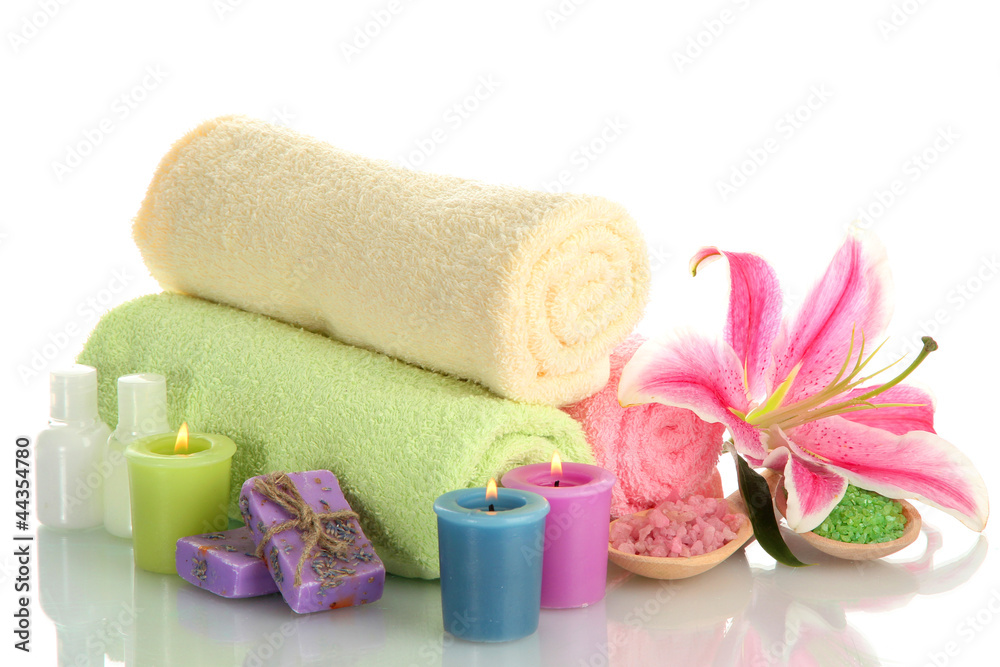 towels with lily, aroma oil, candles, soap and sea salt towels with lily, aroma oil, candles, soap and sea salt