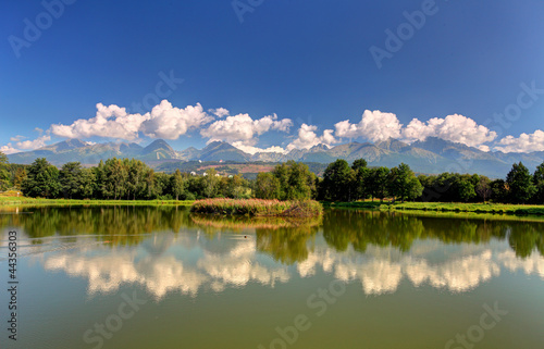 Tatra mountain with reflection in lake - panoramic view
