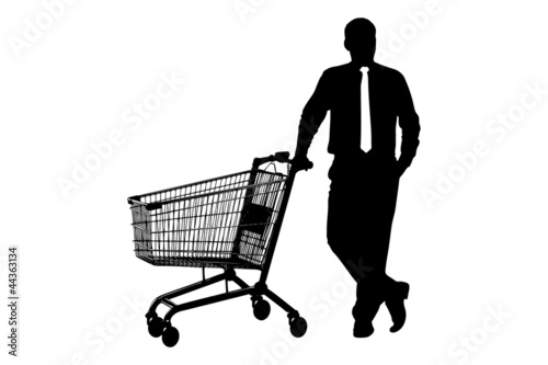 Silhouette of man with empty pushcart