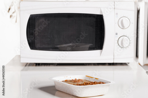 microwave oven with frozen food