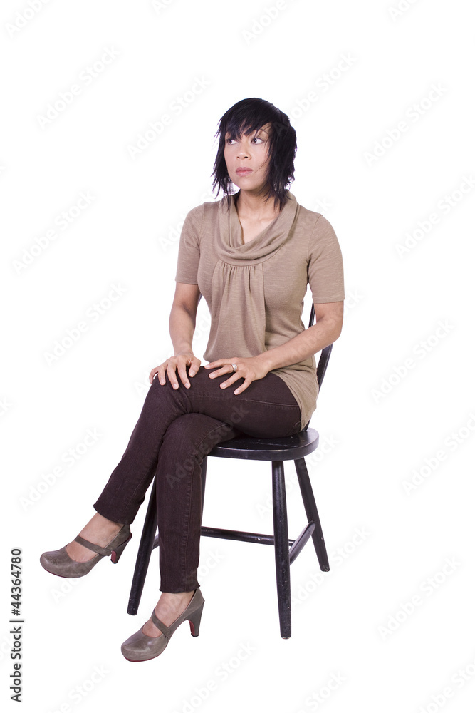 Beautiful Woman Posing on a Chair Beautiful Woman Posing on a Chair