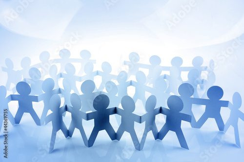 Foto Crowd of blue team people united together in partnership
