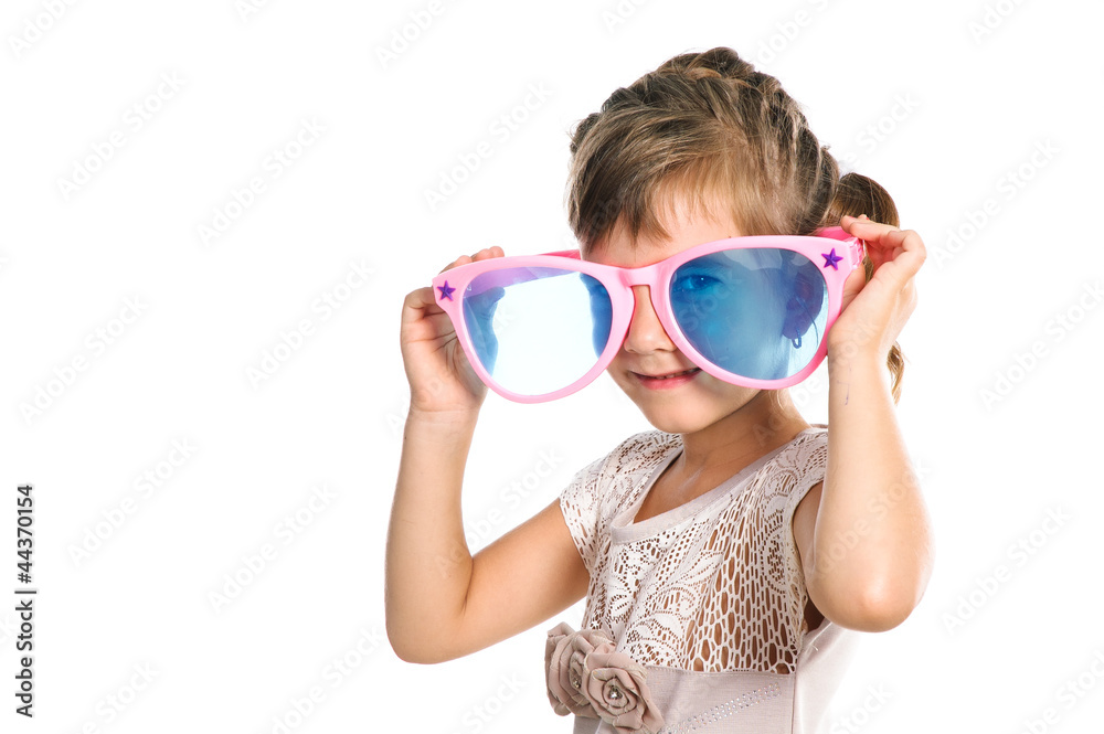 cute girl 5-6 years old wearing huge glasses isolated over white