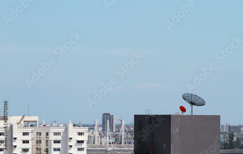 Satellite dish on the commercail building photo