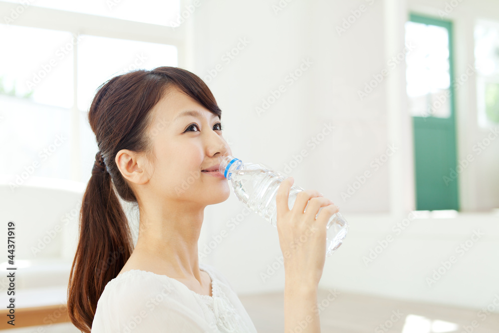 Beautiful young woman relaxing in the room Beautiful young woman relaxing in the room