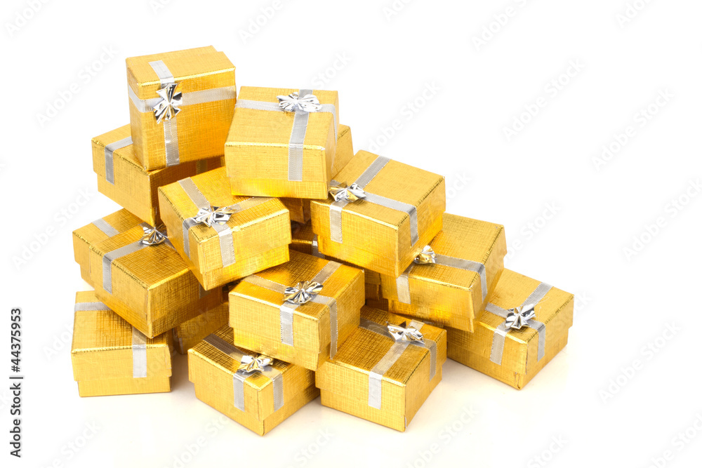 Top view of towel of gold gift boxes Top view of towel of gold gift boxes