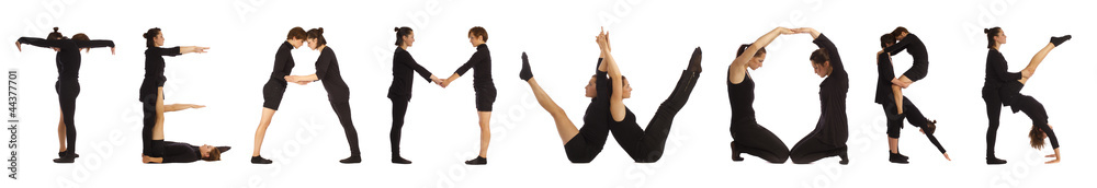 Black dressed people forming TEAMWORK word over white Black dressed people forming TEAMWORK word over white