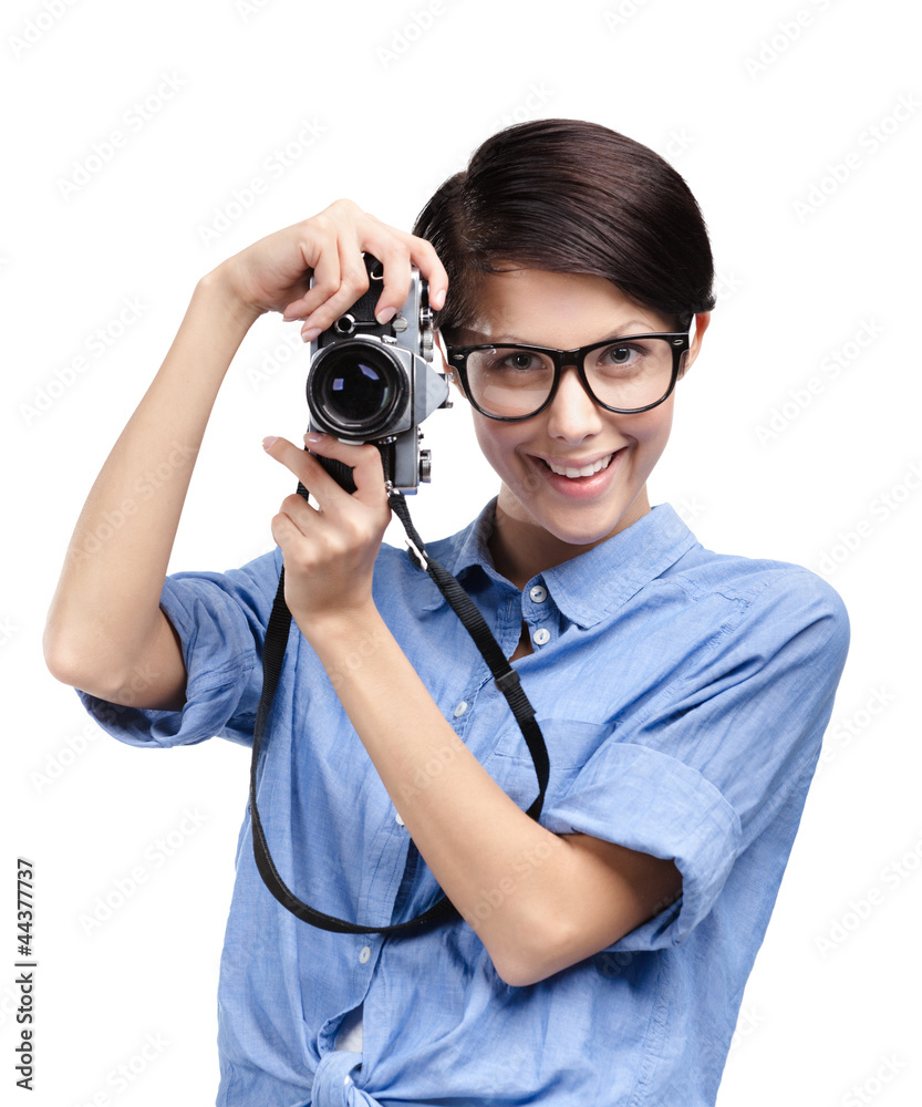 Hipster in spectacles hands retro camera, isolated Hipster in spectacles hands retro camera, isolated
