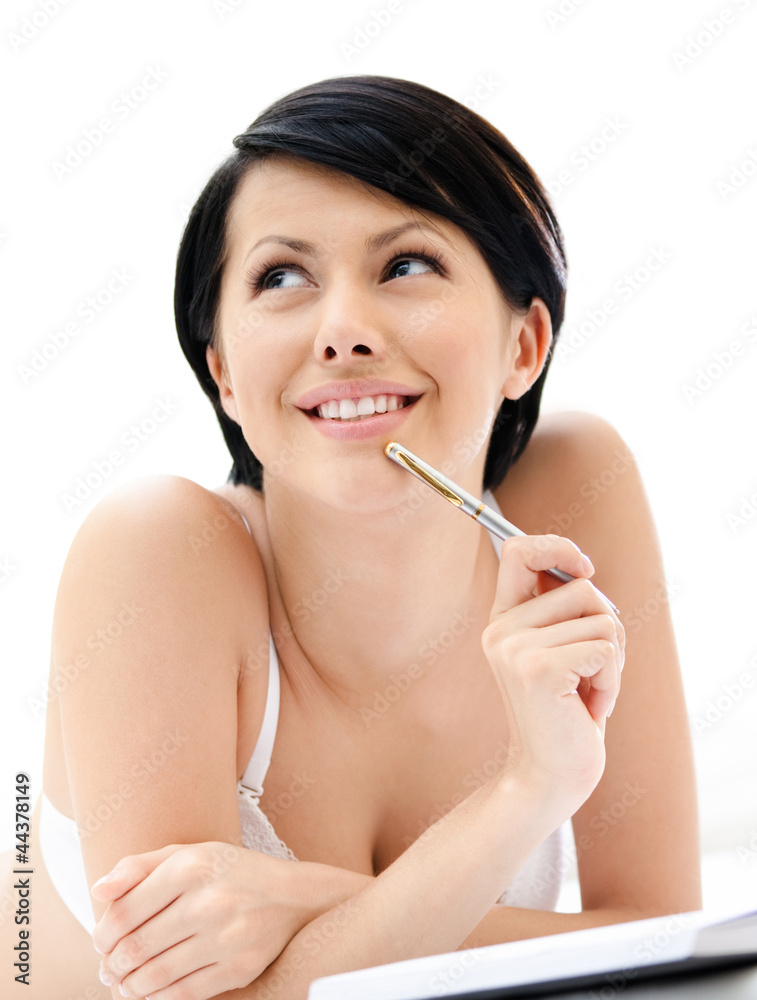 Woman in underwear makes some notes Woman in underwear makes some notes