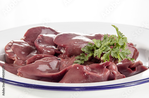 chicken liver with parsley on a plate
