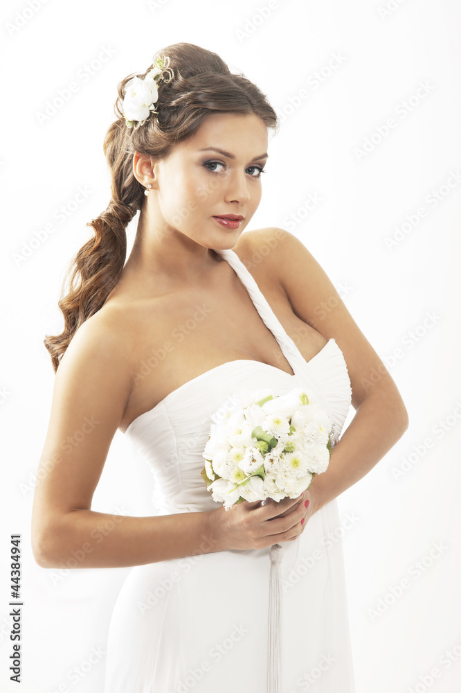 A young and attractive Caucasian bride in white clothes A young and attractive Caucasian bride in white clothes