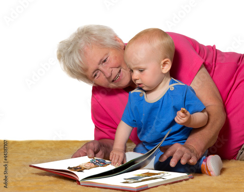 Grandmother and baby reading a book