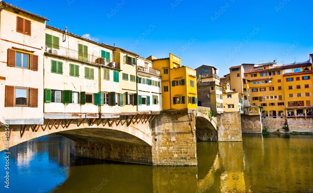 Famous Ponte Vecchio at sunset in Florence, Italy