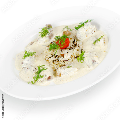 meat in a creamy sauce with mushrooms