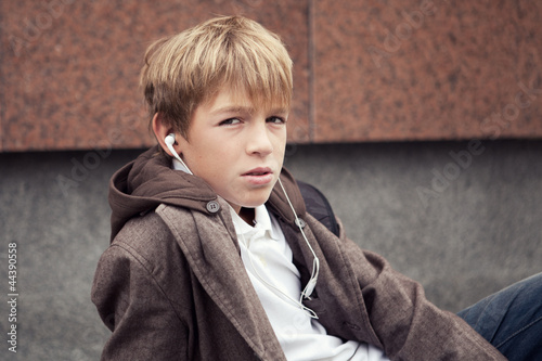 Quadro su tela Portrait of teenager in  jacket, outdoor