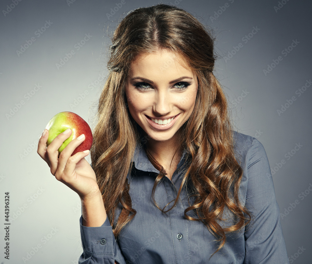 Closeup portrait of cute young business woman smiling at studio. Closeup portrait of cute young business woman smiling at studio.