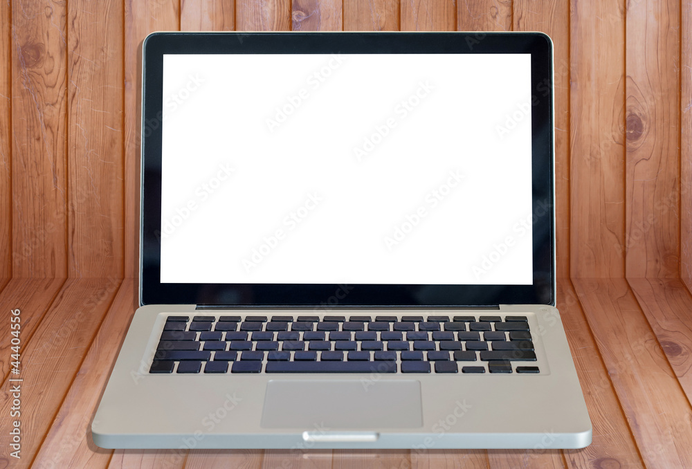 Laptop and wooden background area Laptop and wooden background area