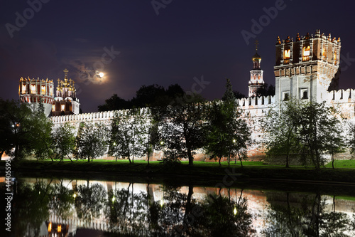 Walls of Novodevichy Convent at moonlit night in Moscow, Russia.