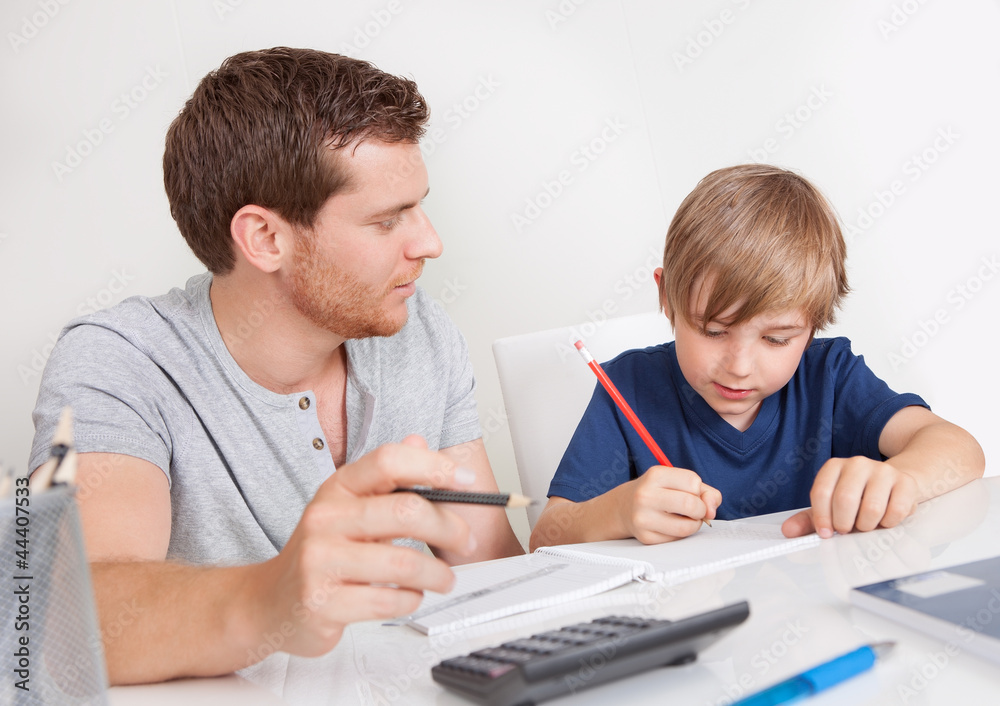 Young boy doing homework Young boy doing homework
